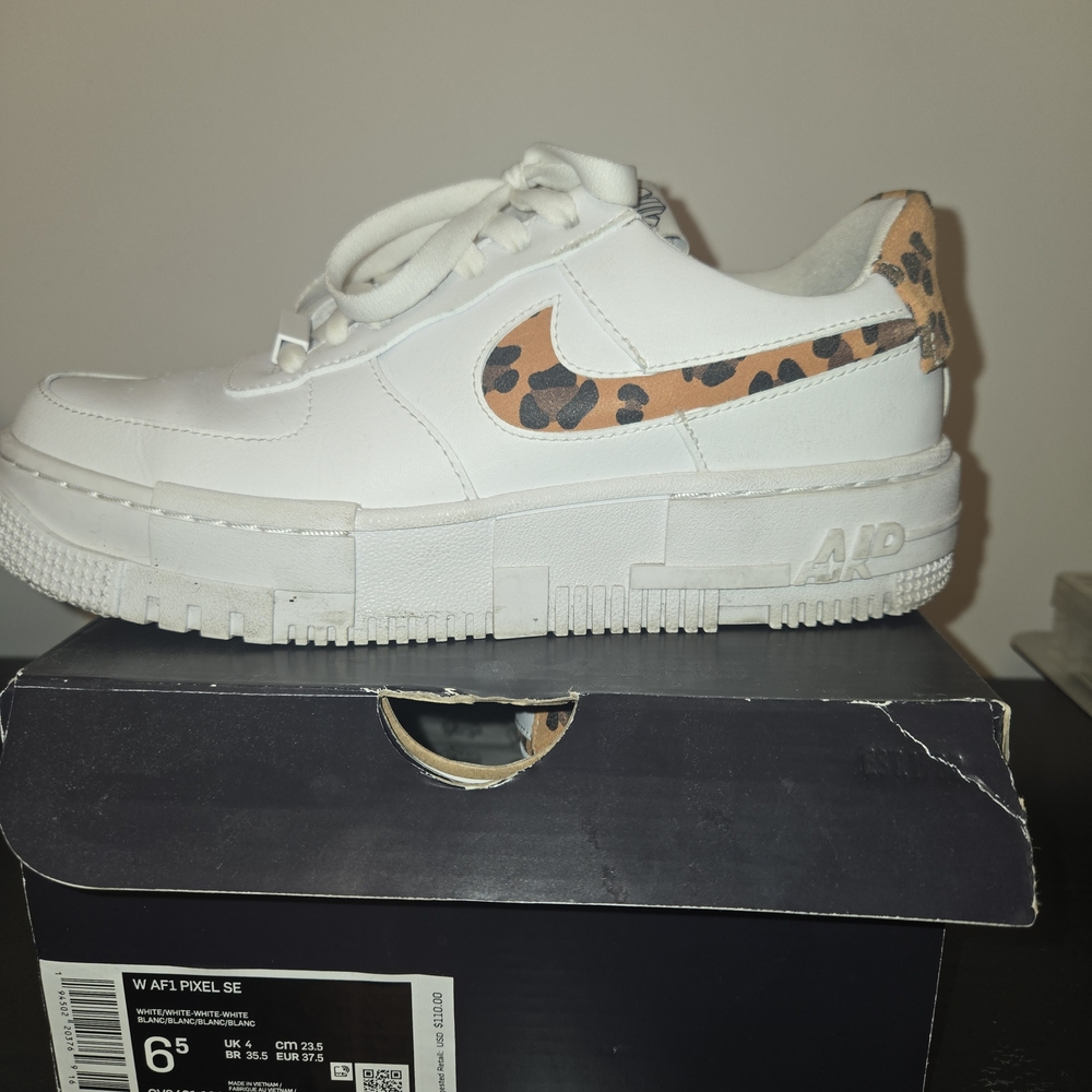 Nike Women's White Sneakers with Leopard Print Accent
